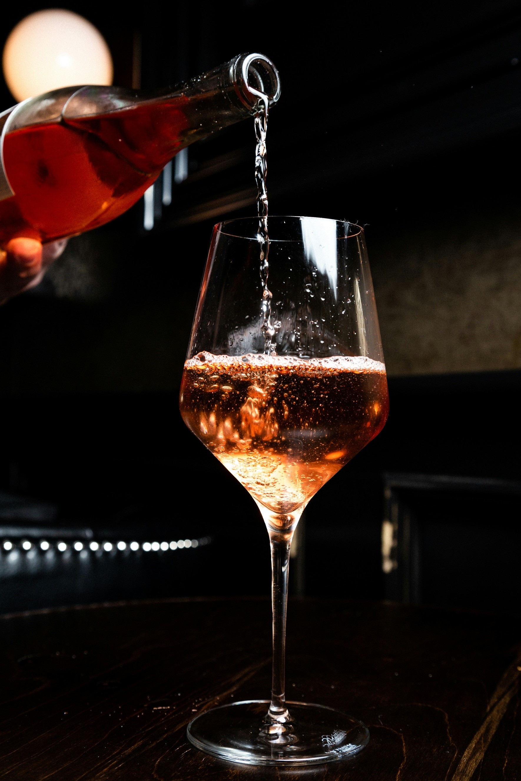 Wine being poured into a wine glass