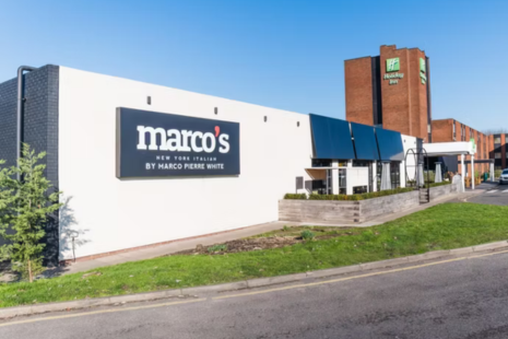 Image showing the exterior of Marco's New York Italian by Marco Pierre White, located at the Holiday Inn Brentwood. The Holiday Inn signage is visible in the background.