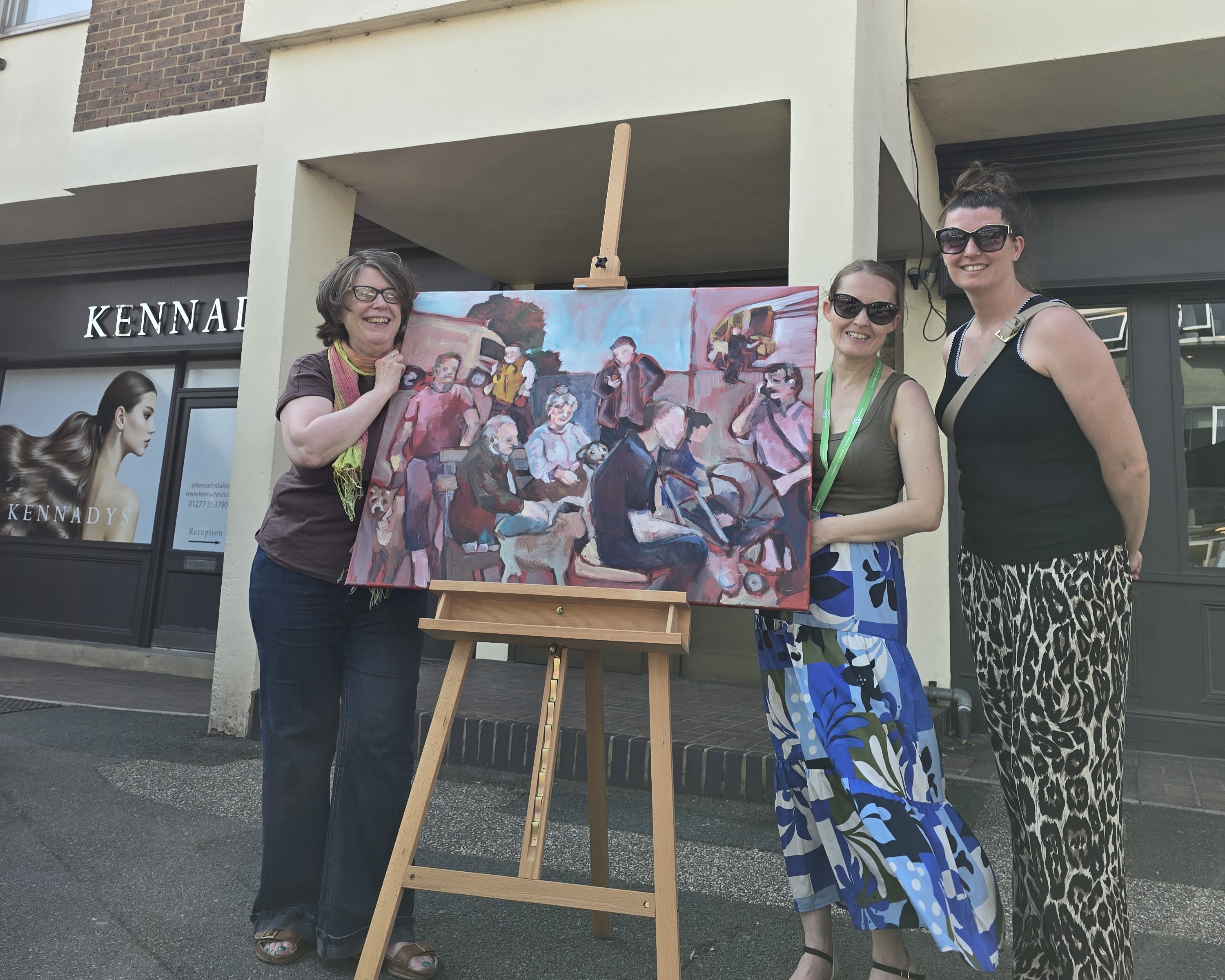 Sarah Walmsley and Villene Hyam from Brentwood Connected, with Nicola Osborne and her painting created for the Brentwood Art Trail event day in Ingatestone.