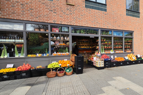 Image showing the front of Health Heart in Brentwood High Street, with fruit and vegetables in baskets outside.