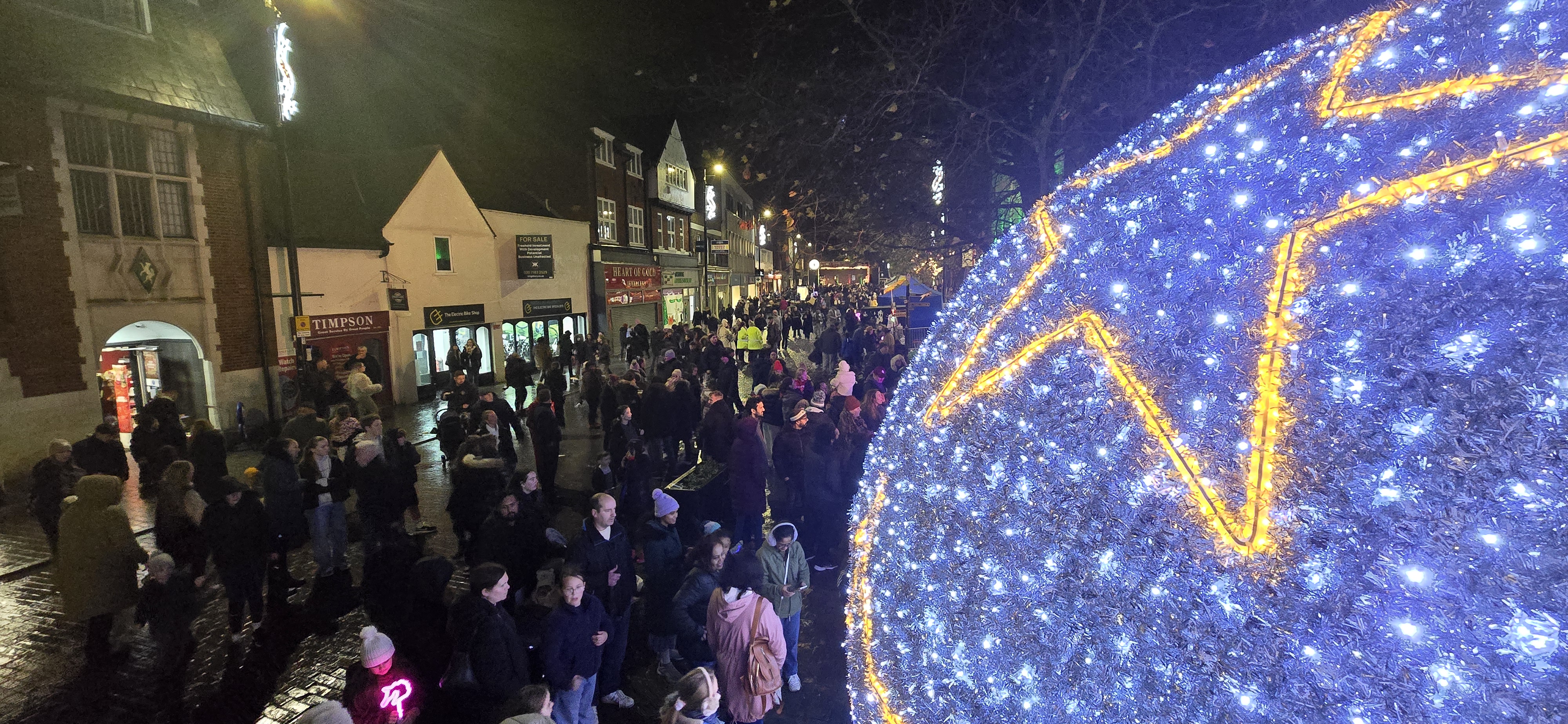 Image showing a crowd around the Giant Christmas Bauble in Brentwood High Street.