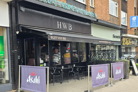 Image showing the front of Hollands Wine Bar in Shenfield, with seating at the front.