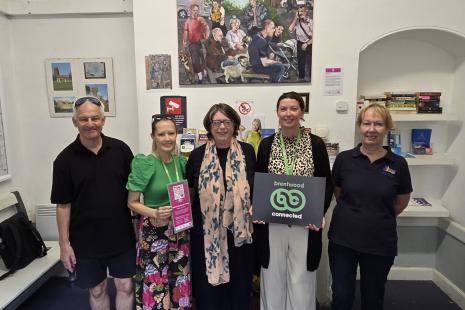 Image showing the unveiling of Nicola Osborne's painting at Ingatestone Station, featuring (L-R) Robert Fletcher, Villene Hyam, Nicola Osborne, Sarah Walmsley and June Povey.