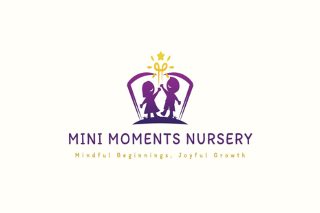 Logo for Mini Moments Nursery, showing two children holding hands inside a purple book shape.