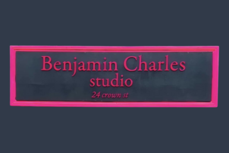 Image showing the black and pink sign of Benjamin Charles Studio at 24 Crown Street.