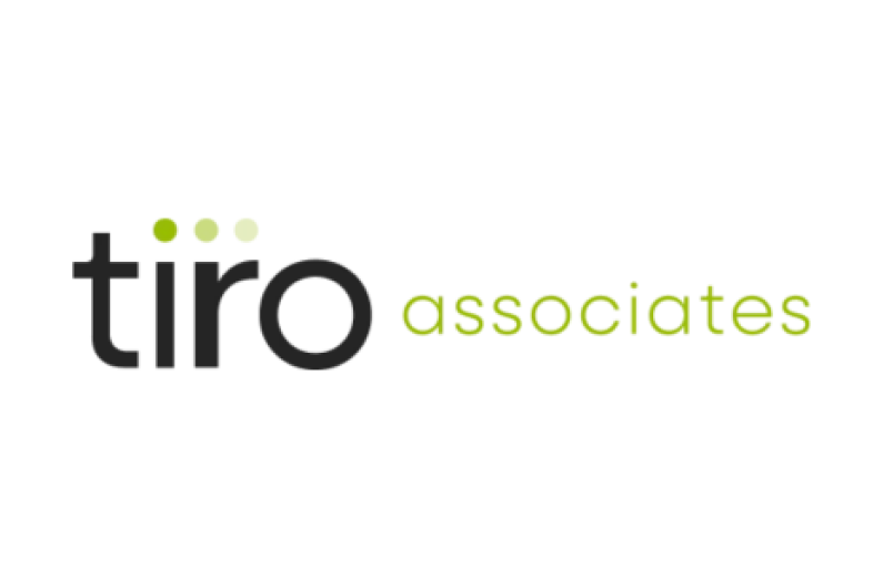 Logo for tiro associates with the word 'tiro' in black and 'associates' in lime green.