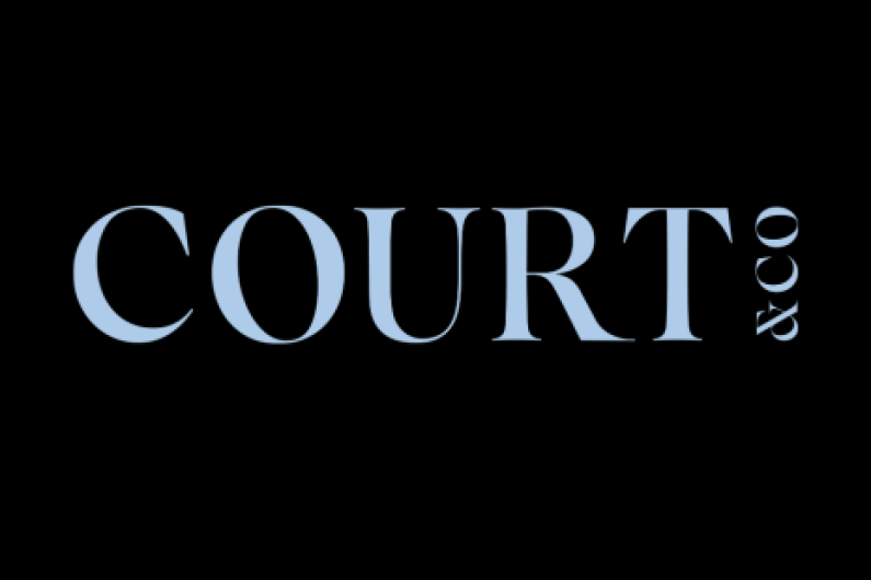 Court & Co logo - pale blue on a black background.