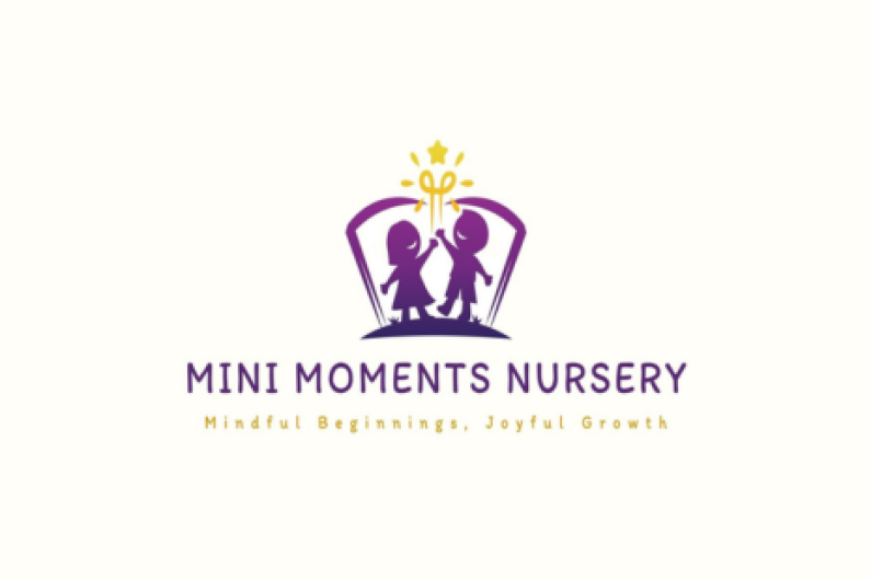 Logo for Mini Moments Nursery, showing two children holding hands inside a purple book shape.