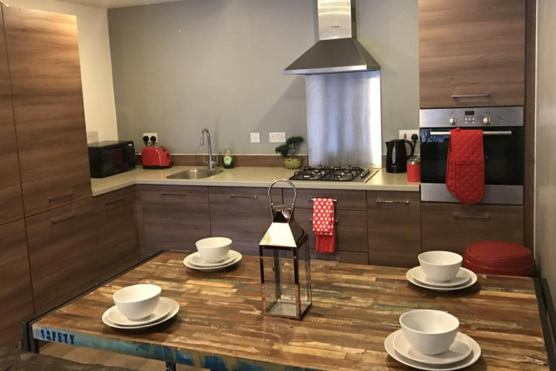 Kitchen area at Executive Brentwood Apartment