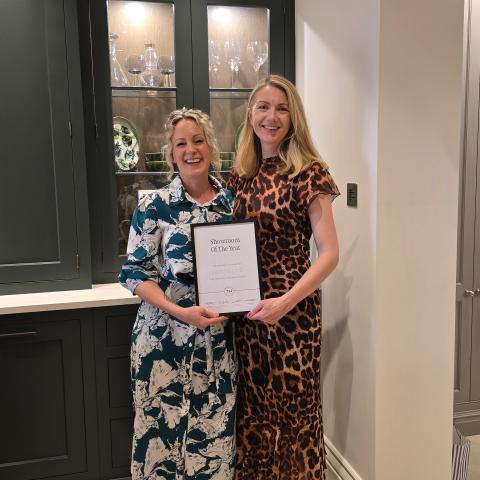 Image showing Izzy and Susan from Tom Howley Kitchens in Brentwood, with a certificate for Showroom of the Year.