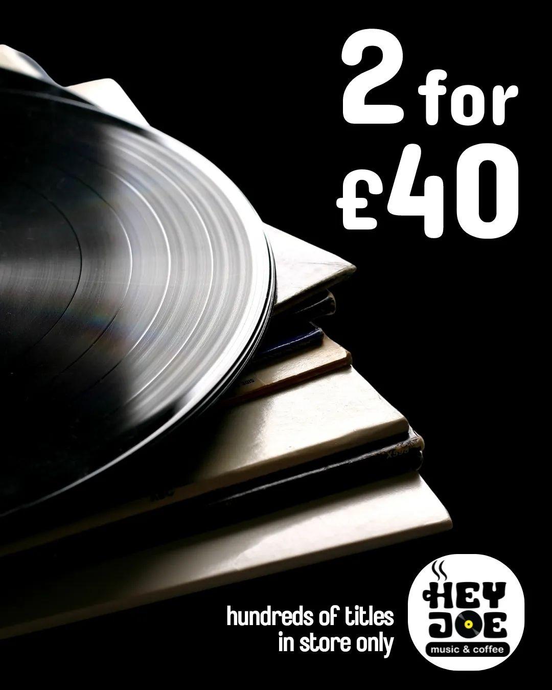 Black and white image showing a vinyl record on top of some covers, with white text reading '2 for £40'. The Hey Joe Music & Coffee logo is on the bottom right corner, along with the words 'hundreds of titles. In store only'.