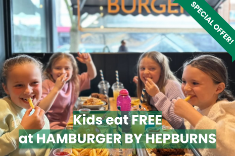 Image promoting a kids eat free offer at Hamburger by Hepburns for Summer 2025