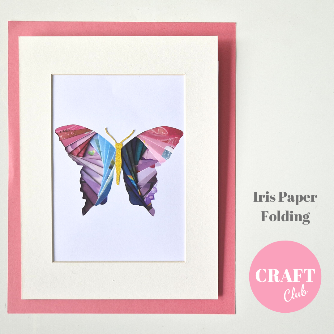 Image showing a colourful butterfly made from folded paper pieces.